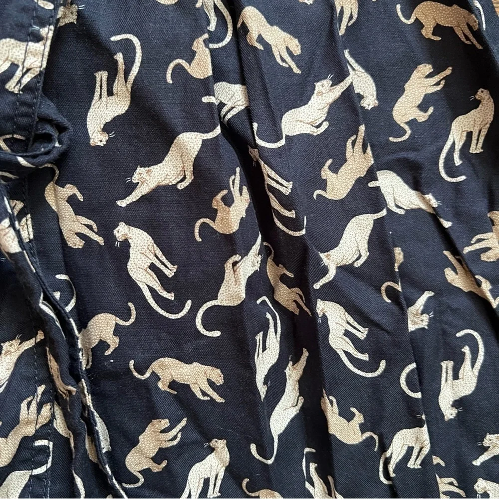 Ann Taylor blue midi with leopards skirt size 0